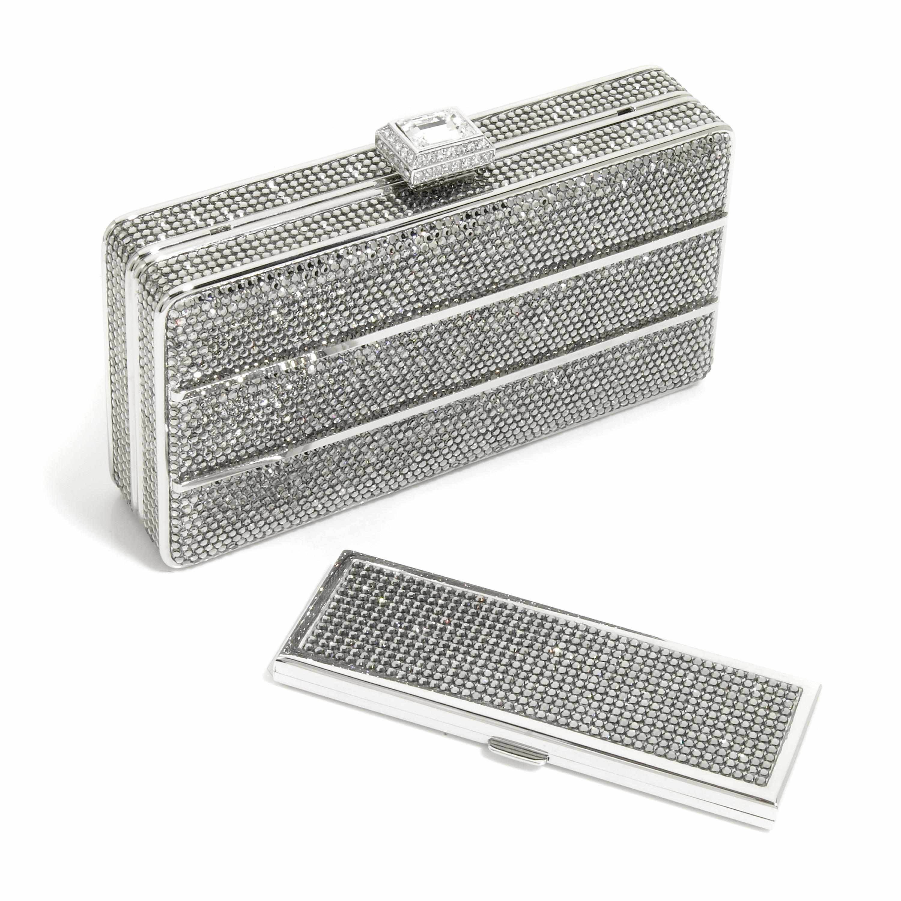 Appraisal: A silver and pewter crystal purse with stripes together with