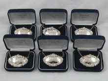 Appraisal: Six individually boxed hallmarked silver wine labels