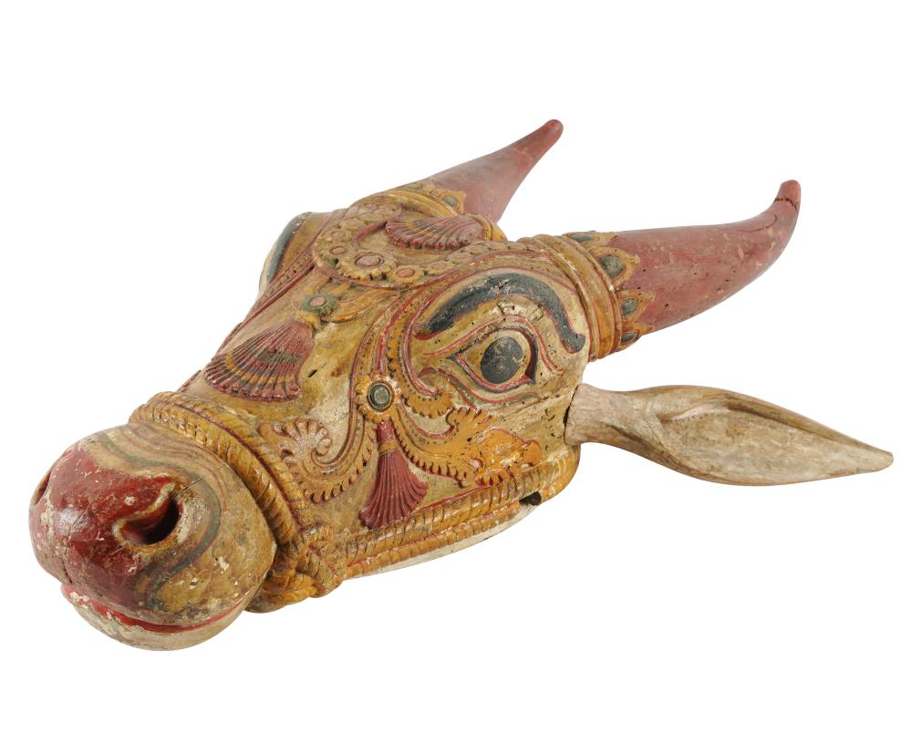 Appraisal: CENTRAL AMERICAN CARVED PAINTED WOOD MASKmodeled as a bull Provenance