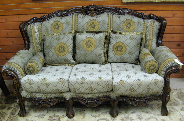 Appraisal: CARVED AND UPHOLSTERED MAHOGANY SOFA Chippendale influence recent Length inches