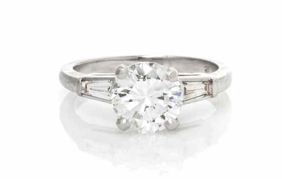 Appraisal: A Platinum and Diamond Ring containing one round brilliant cut