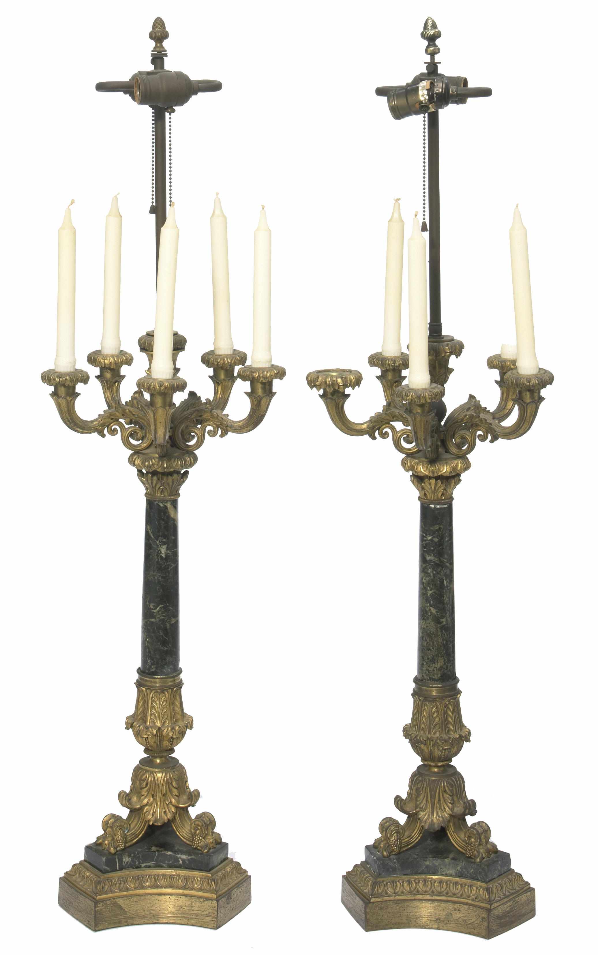 Appraisal: A pair of Charles X gilt metal and marble lamps