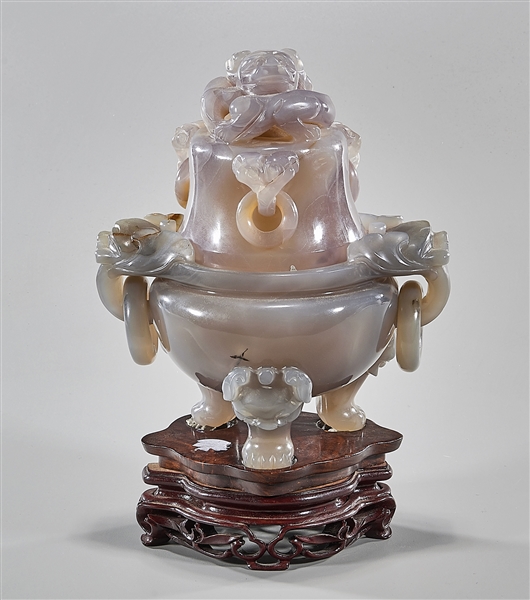 Appraisal: Chinese carved agate covered tripod censer with beast-head forms to