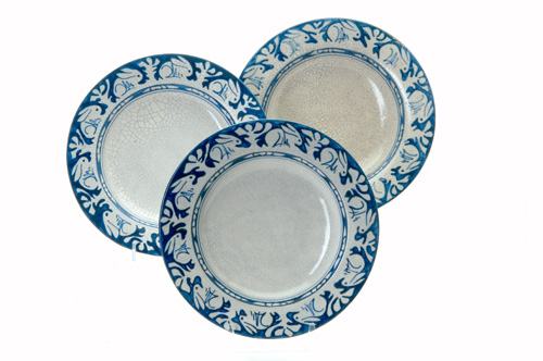 Appraisal: DEDHAM Three Crackleware deep soup plates in the Clockwise Rabbit