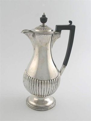 Appraisal: A modern baluster hot water jug part fluting on the