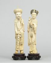 Appraisal: Carved Ivory Chinese Emperor and Emperess Carved ivory Chinese emperor