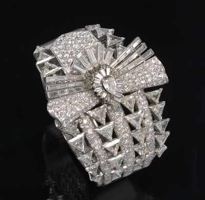 Appraisal: A Retro Diamond Cuff Bracelet Platinum hinged cuff Retro bracelet