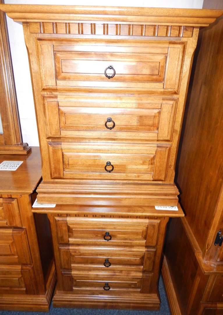 Appraisal: A pair of oak bedside chests each of three drawers