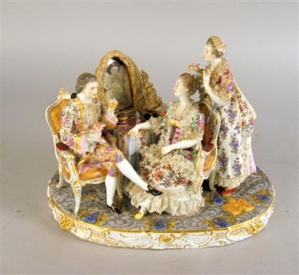 Appraisal: German porcelain lace figure group the toilette Modeled as three