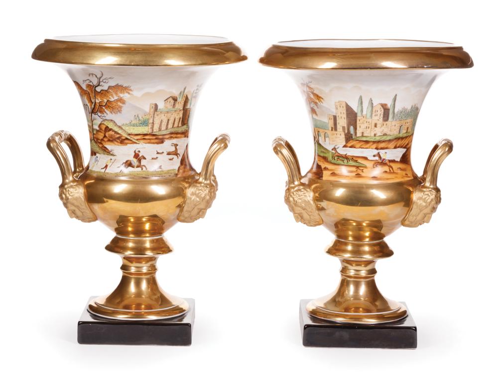 Appraisal: Pair of Paris Porcelain Campagna Urns gilt ground with landscapes