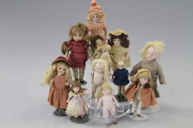 Appraisal: LOT OF ELEVEN ALL BISQUE DOLLS Six of the dolls