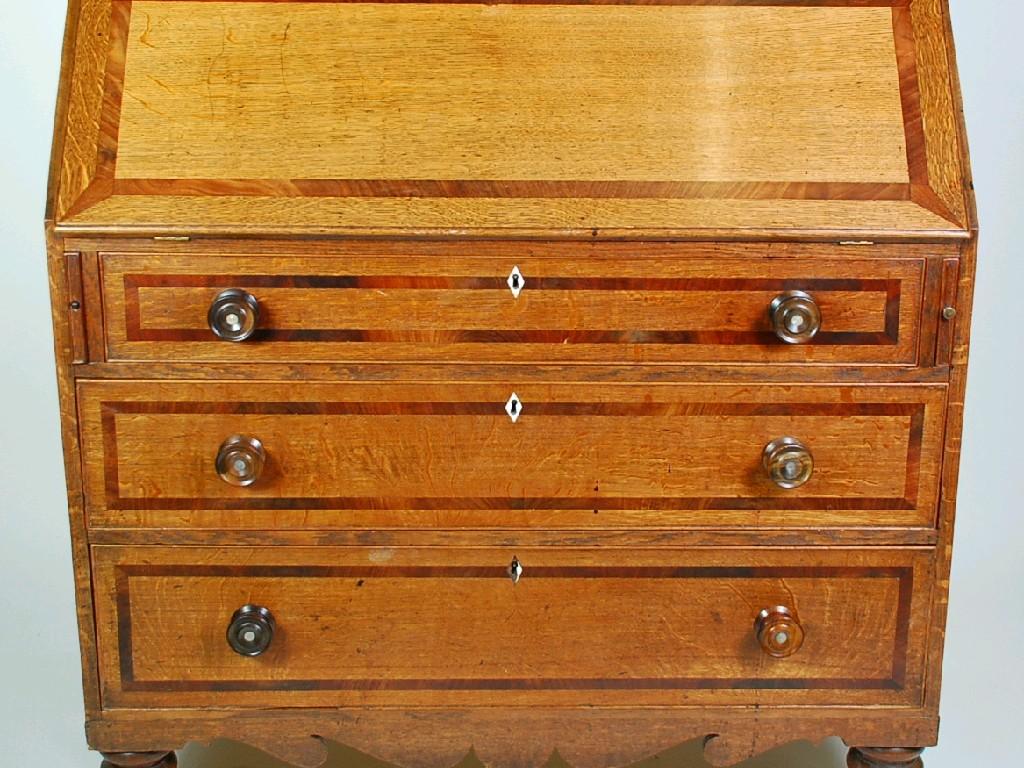 Appraisal: NINETEENTH CENTURY MAHOGANY INLAID OAK BUREAU the oblong top above