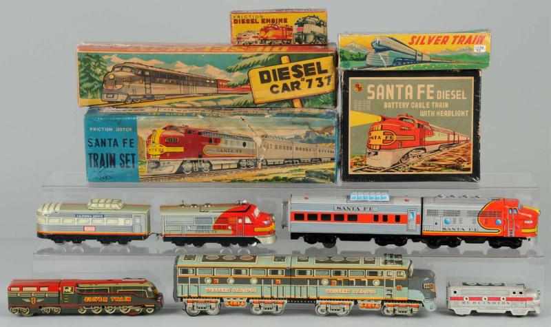 Appraisal: Lot of Tin Train Engines Description Japanese Friction and battery-operated