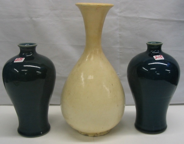 Appraisal: A GROUP OF THREE CHINESE GLAZED POTTERY VASES One is