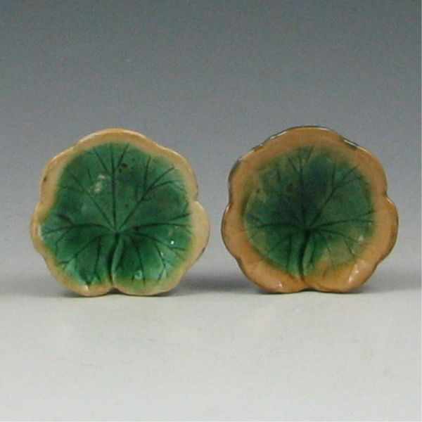 Appraisal: Two Majolica Geranium Butter Pats both unmarked left has makers