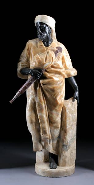 Appraisal: A carved onyx and marble figure of a Moor The