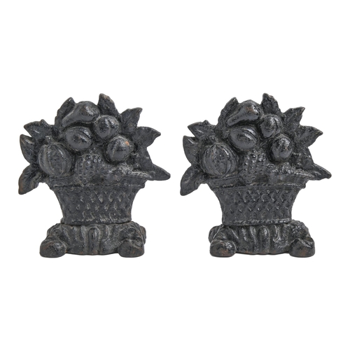 Appraisal: A pair of Victorian cast iron fruit basket chimney ornaments