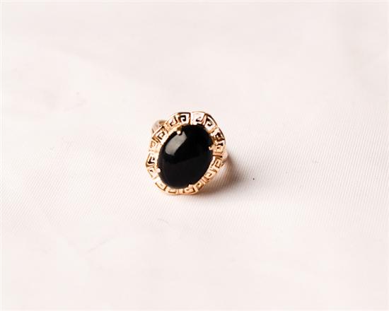 Appraisal: k Ring with Oval Black Onyx Cabochon with Greek Key