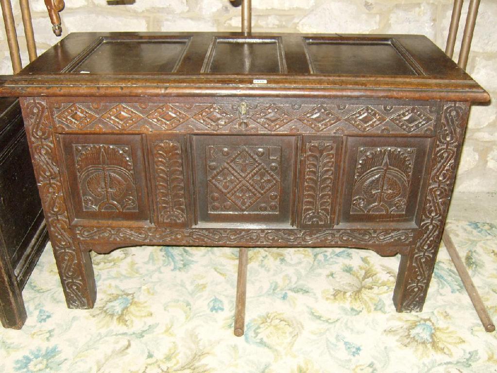 Appraisal: A good th century oak coffer with panelled top frame