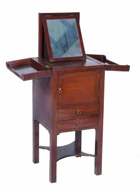 Appraisal: A TH CENTURY MAHOGANY WASHSTAND with lift up mirror and