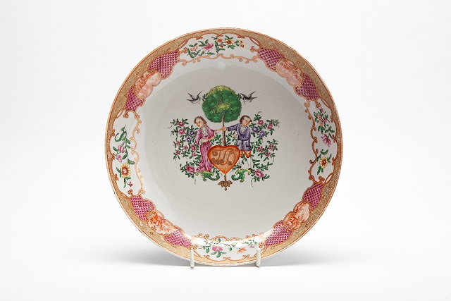 Appraisal: A CHINESE EXPORT PORCELAIN SHALLOW DISH the centre painted with