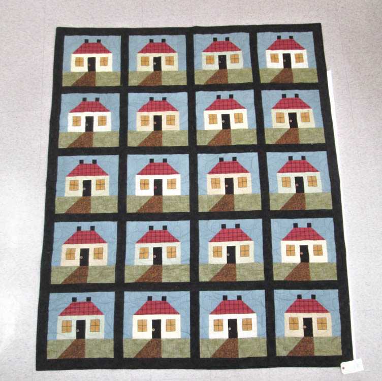 Appraisal: COTTON FLANNEL QUILT machine stitched with repeating cottage pattern with