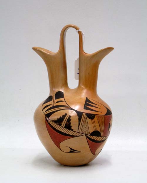 Appraisal: SUSIE YOUVELLA HOPI TRADITIONAL POLYCHROME POTTERY WEDDING VASE having twin