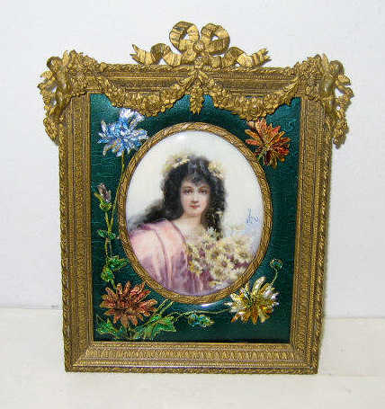 Appraisal: FRENCH HAND PAINTED PORTRAIT MINIATURE Of a young woman with