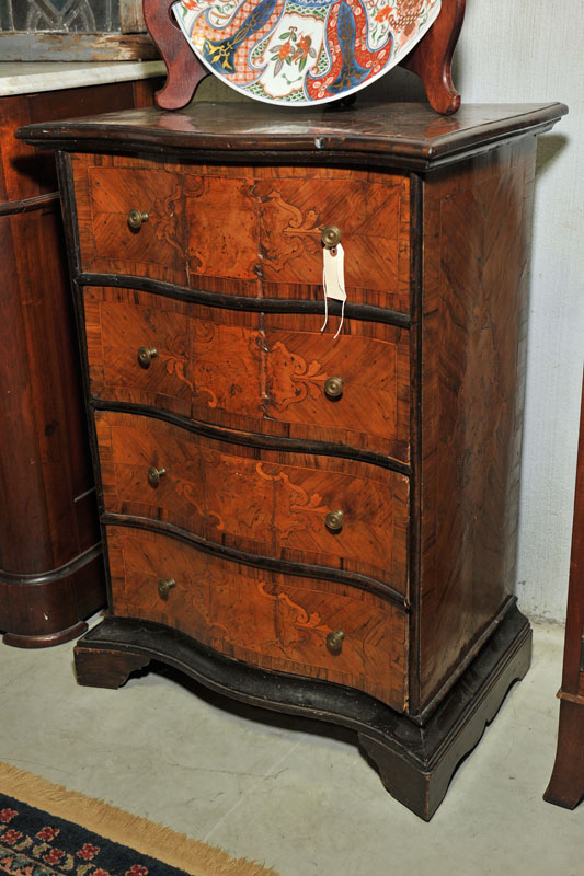 Appraisal: DIMINUTIVE CHEST French style chest having a serpentine front Marquetry