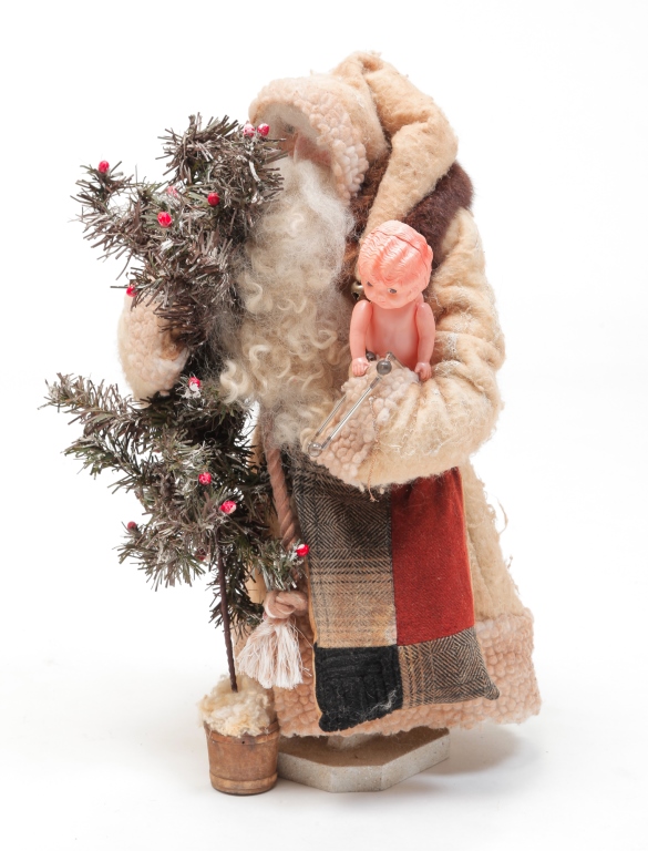 Appraisal: American th century Standing Santa wearing a tan coat holding