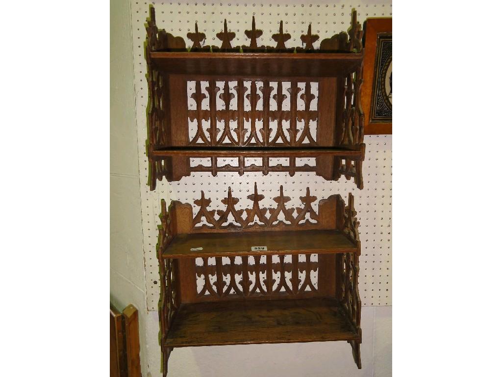 Appraisal: A pair of oak mounted bookstands in the Gothic style