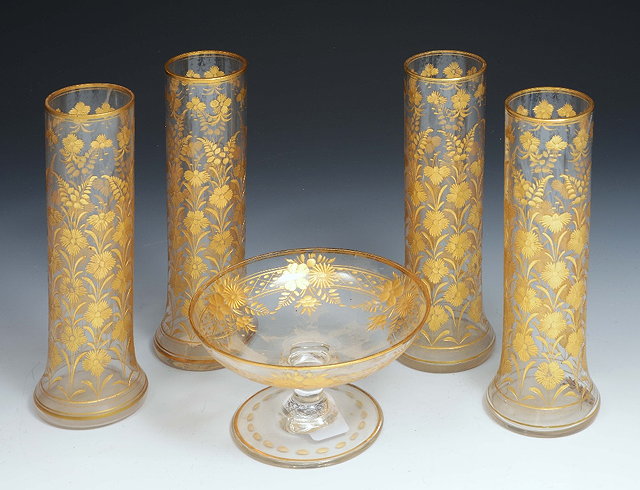 Appraisal: A set of four glass spill vasesintaglio cut and decorated