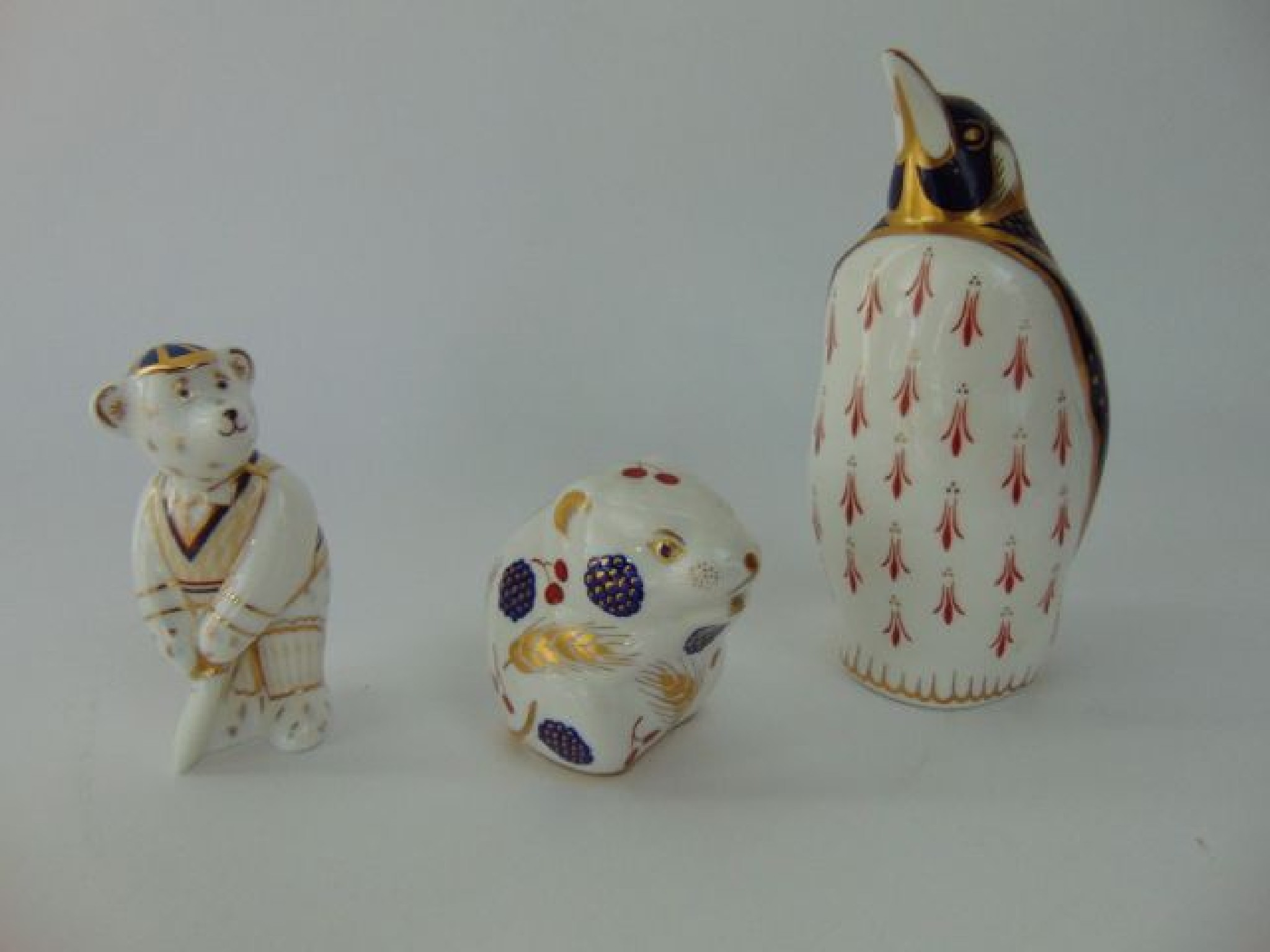 Appraisal: A collection of three Royal Crown Derby paperweights with Imari