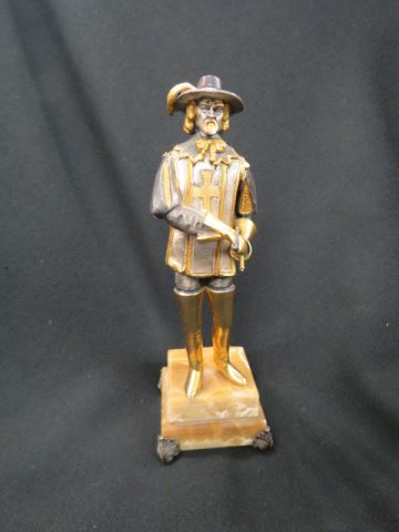 Appraisal: Bronze Statue of a Musketeer or Cavalier gold and silver