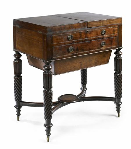 Appraisal: A Regency mahogany compendium dressing table the bi-fold top enclosing