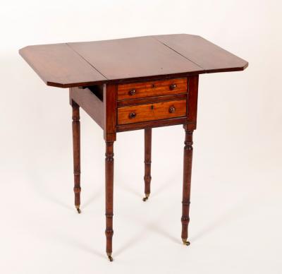 Appraisal: A Regency mahogany Pembroke worktable on turned legs the top