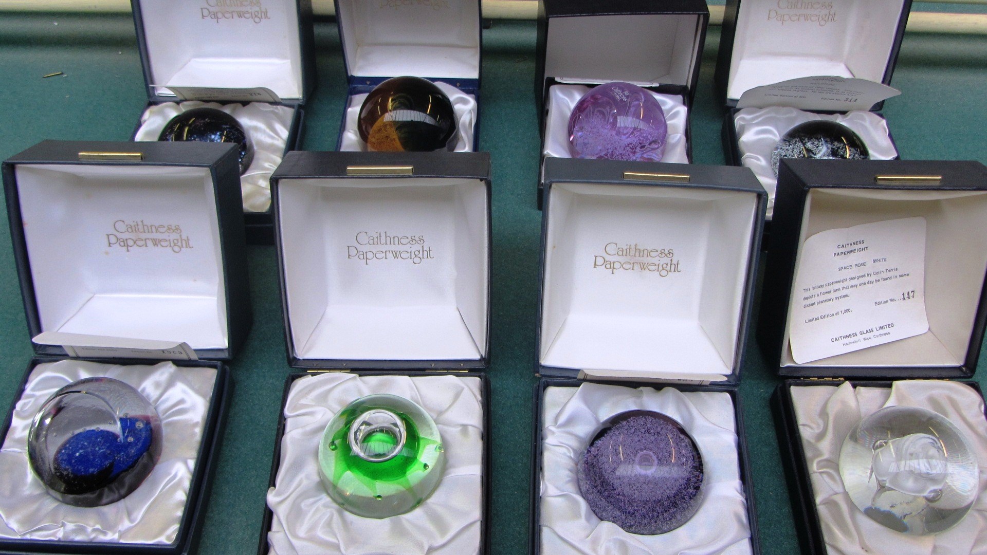 Appraisal: A group of eight Caithness paperweights including Sculpture' by Peter