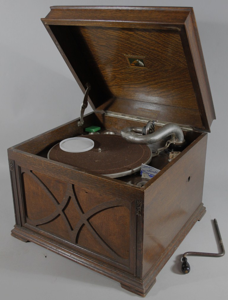 Appraisal: A mid thC oak cased gramophone the domed lid hinging