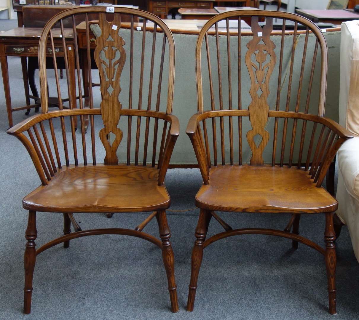 Appraisal: A pair of George III style ash and elm Windsor