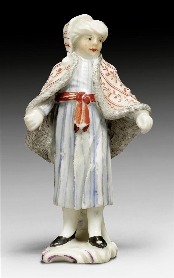 Appraisal: SMALL FIGURE OF A GIRL IN A FUR-LINED CAPE ZURICH