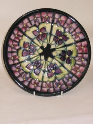 Appraisal: A MOORCROFT POTTERY PLATE date mark for tube lined in