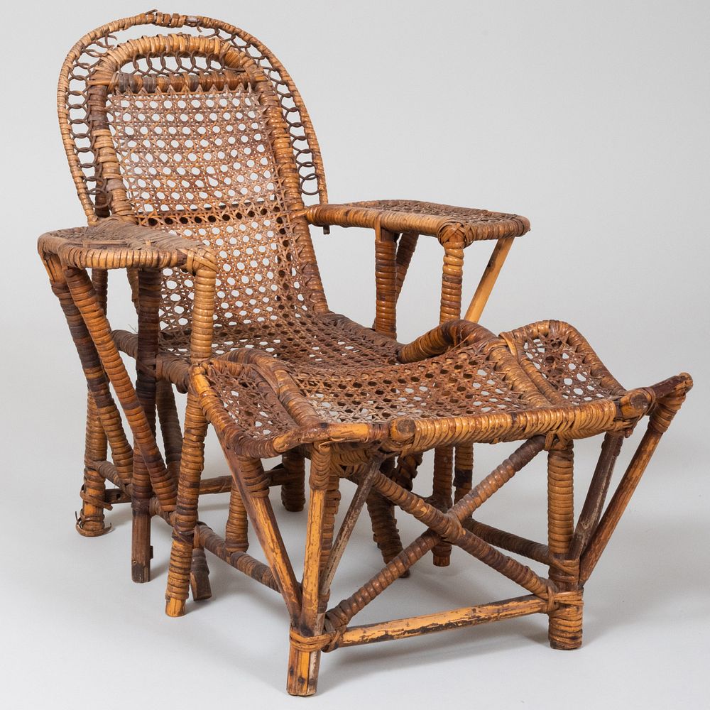 Appraisal: Miniature Wicker Chaise Lounge x x in Condition Losses throughout