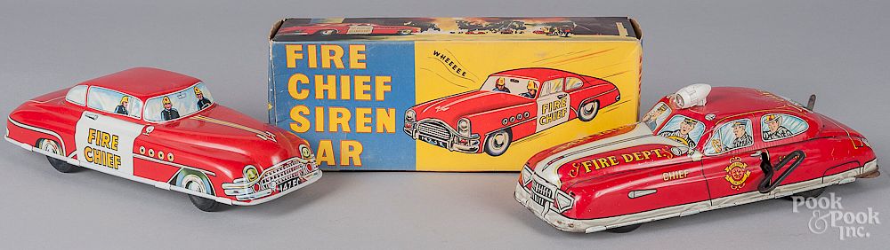 Appraisal: Two tin litho fire chief cars Two tin litho fire