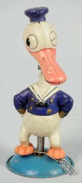 Appraisal: Celluloid Walt Disney Donald Duck Nodder Toy Japanese Pre-war Rubber