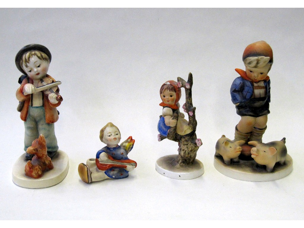 Appraisal: Four Hummel figures to include Farm Boy TMK Apple Tree