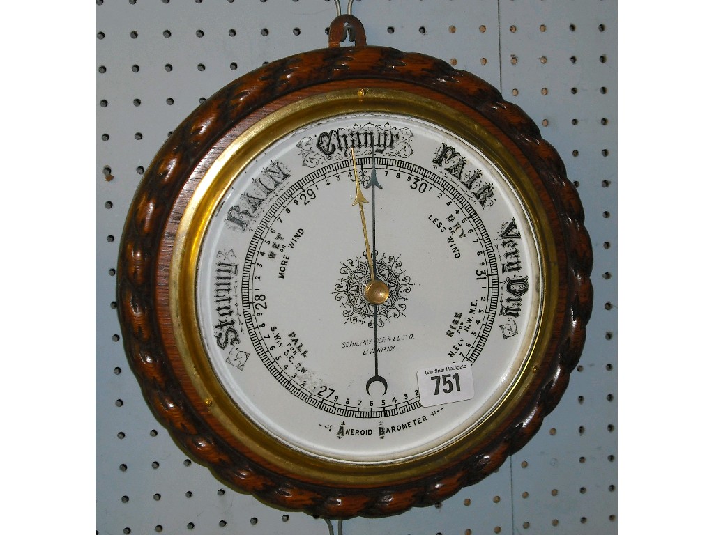 Appraisal: Oak aneroid barometer the white dial signed Schierwater Lloyd Liverpool