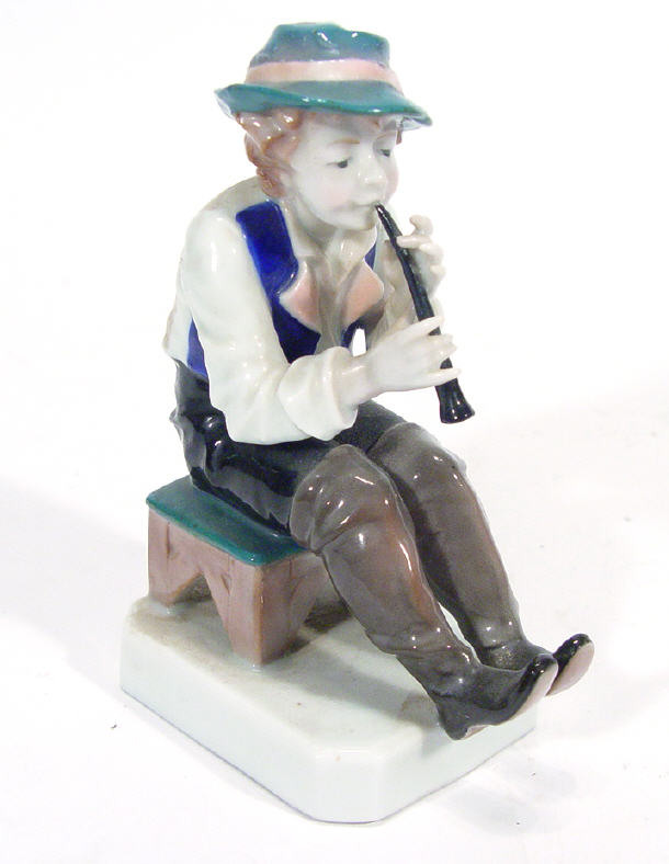 Appraisal: Hand-painted Dresden porcelain flute player printed factory marks and paper