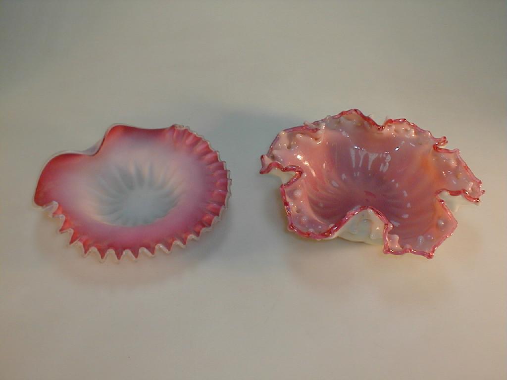 Appraisal: A Victorian pink satin glass shell shaped dish wide a