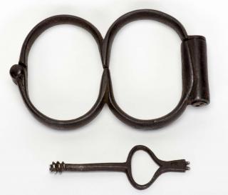 Appraisal: Plug Handcuffs Circa Cuffs that resemble the number in shape