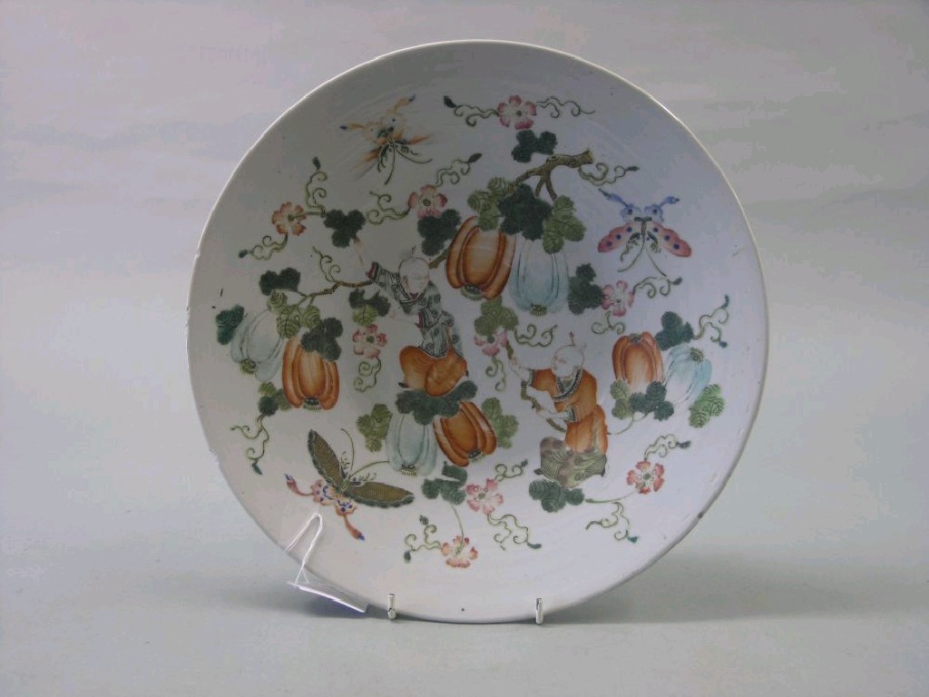 Appraisal: A th century Chinese porcelain wall plate painted with two